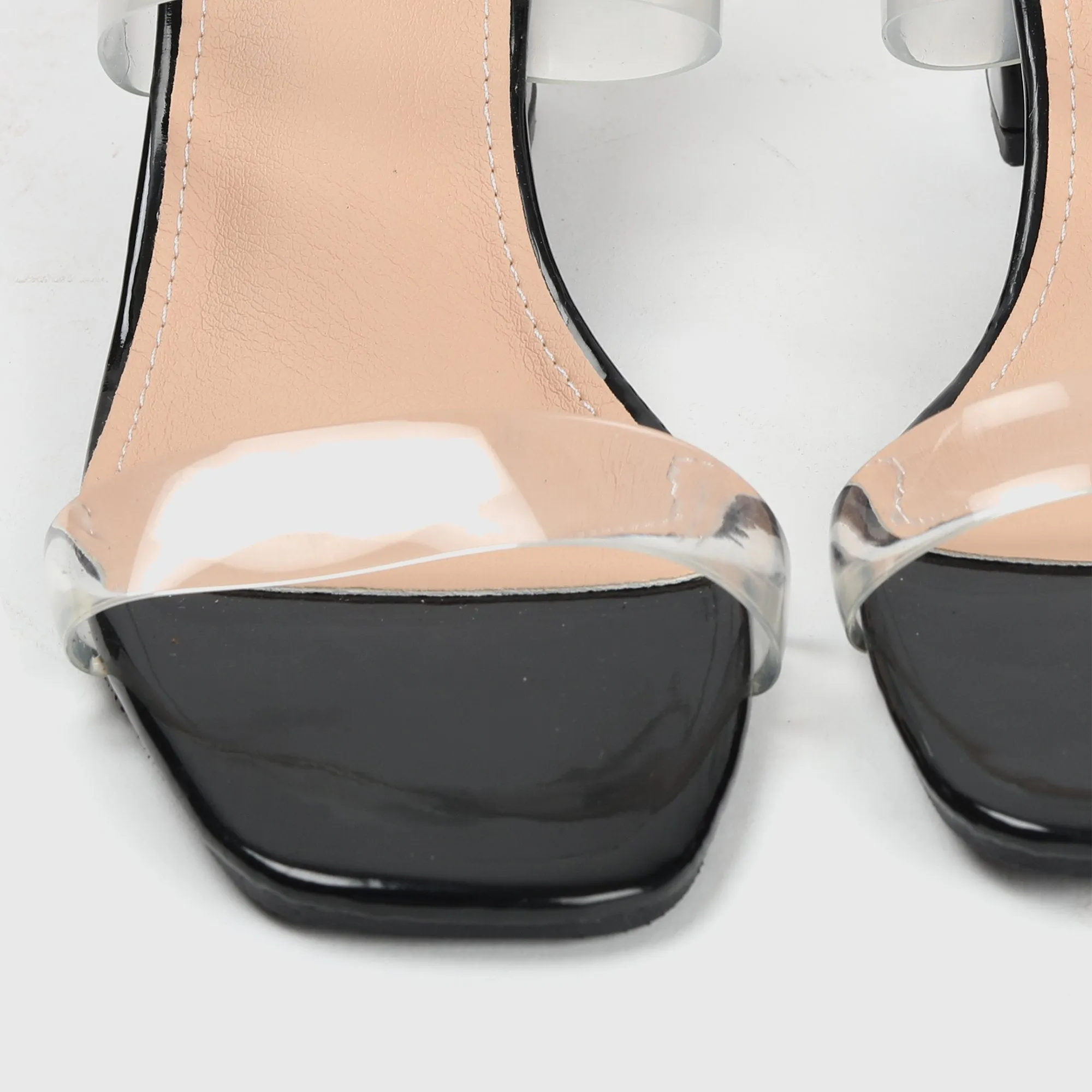 Symmetrical Clear Strap Slip Ons